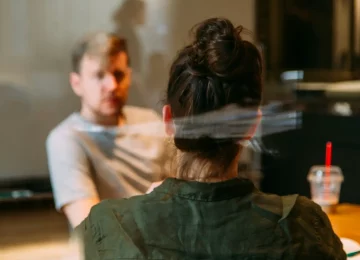 A man engaged in a counselling session, reflecting the person-centred approach provided by Lynn Guthrie at The Empathic Therapist.